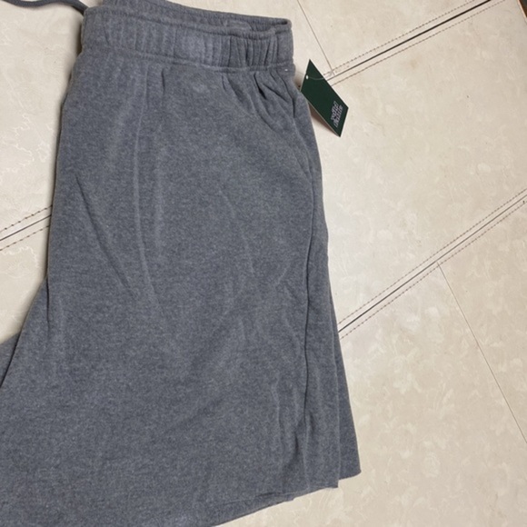Grey shorts size l tee shirt material. $6 each. I have 24 of them - Picture 2 of 4